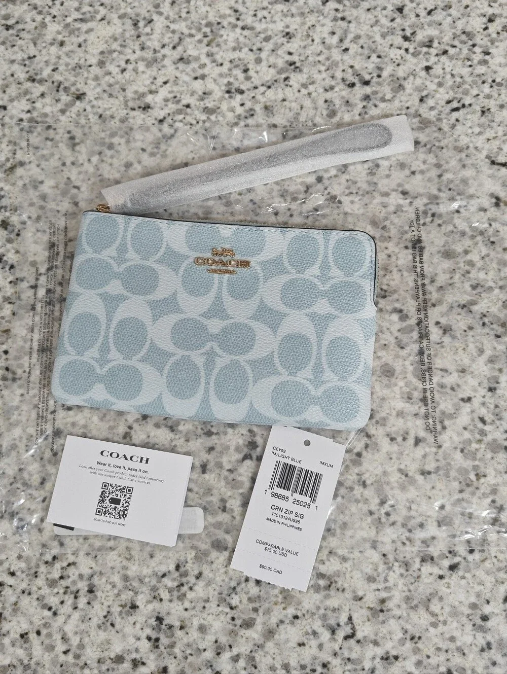 Coach Corner Zip Wristlet In Signature Canvas (Light blue)
